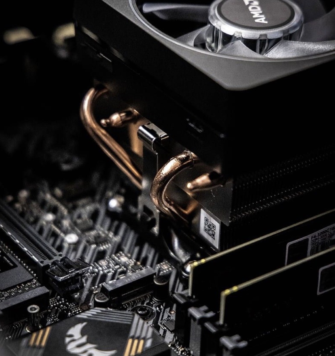 CPU cooler with copper heatpipes on motherboard