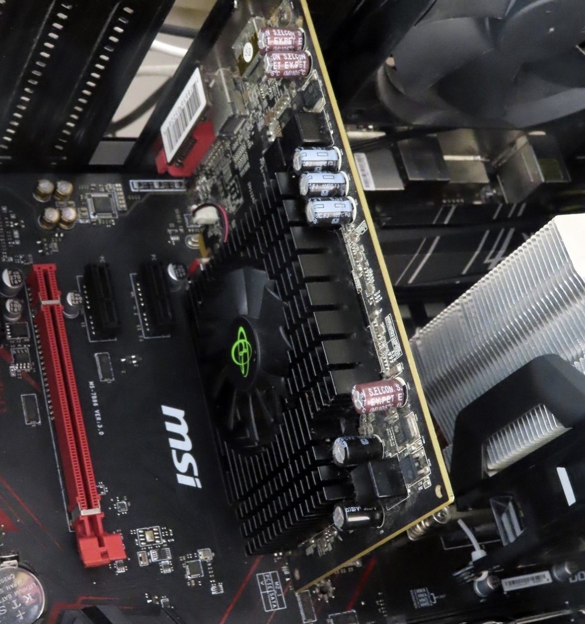 MSI motherboard with PCIe slots and components